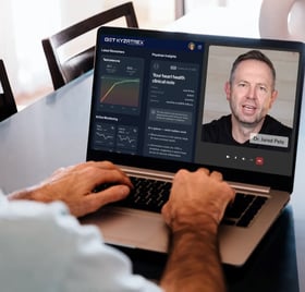 Clinician reviewing lab results during a video consultation